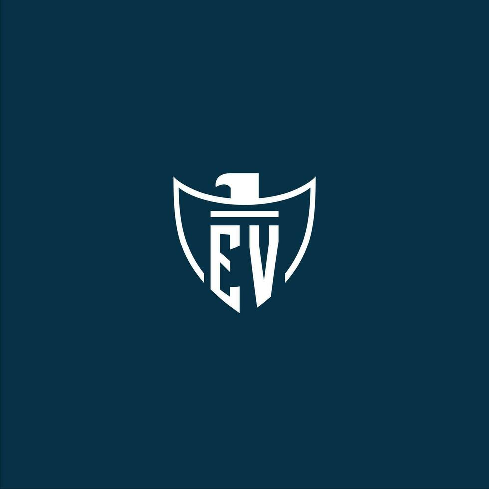 EV initial monogram logo for shield with eagle image vector design