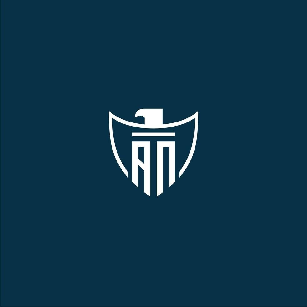 AN initial monogram logo for shield with eagle image vector design