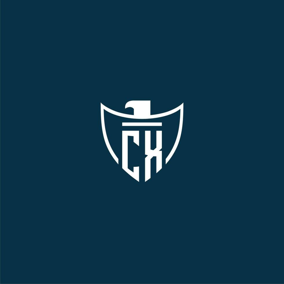 CX initial monogram logo for shield with eagle image vector design