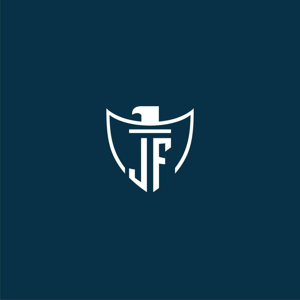 JF initial monogram logo for shield with eagle image vector design
