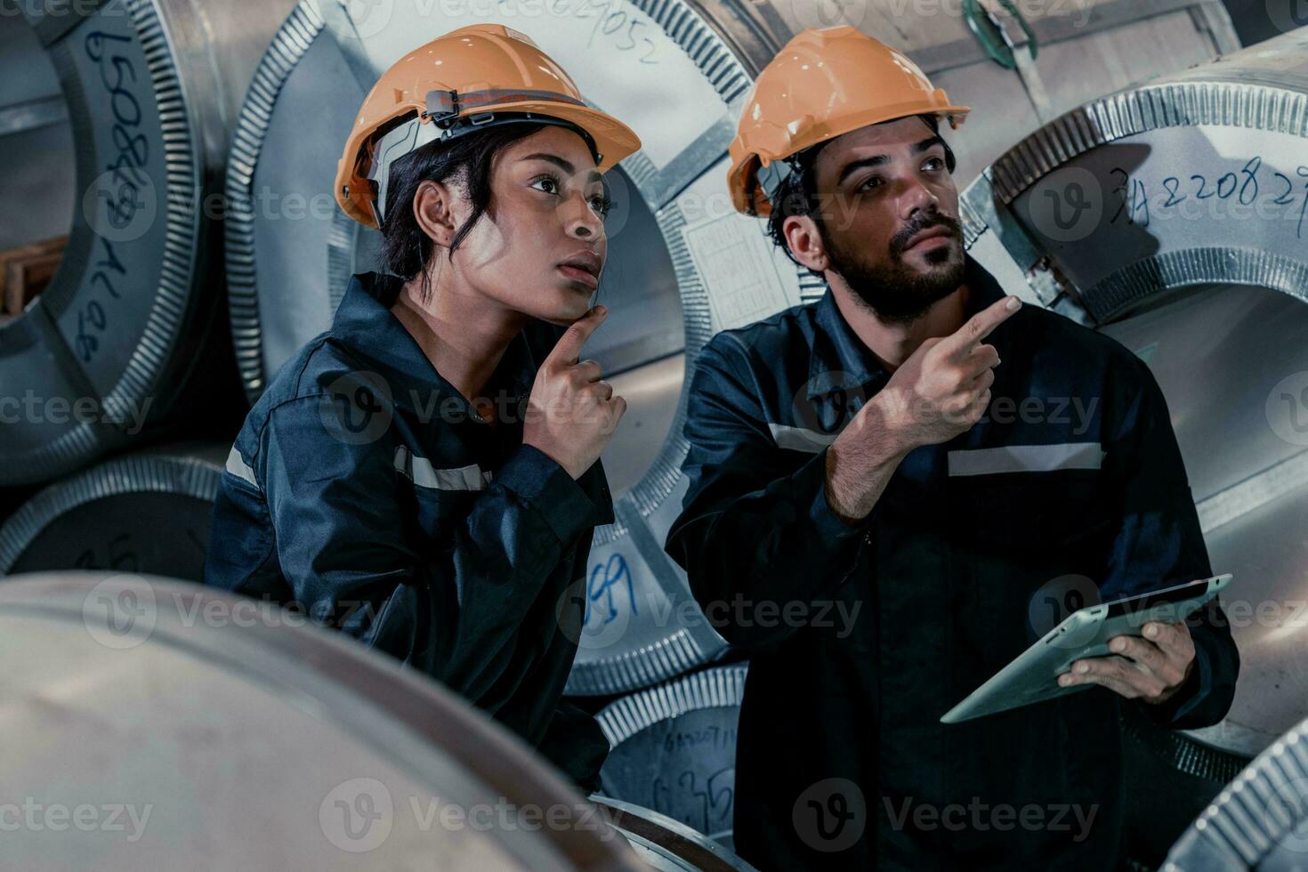 Before assembling, modifying sheet metallic components, skilled metal roofing mechanics review the blueprint, sketch, scheme, instruction in detail and calculate the correct size of steel materials. photo
