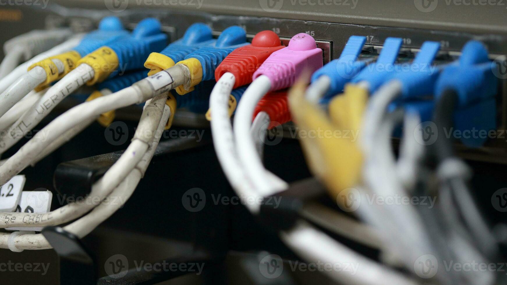 Technology center network server room with UTP Network cables photo