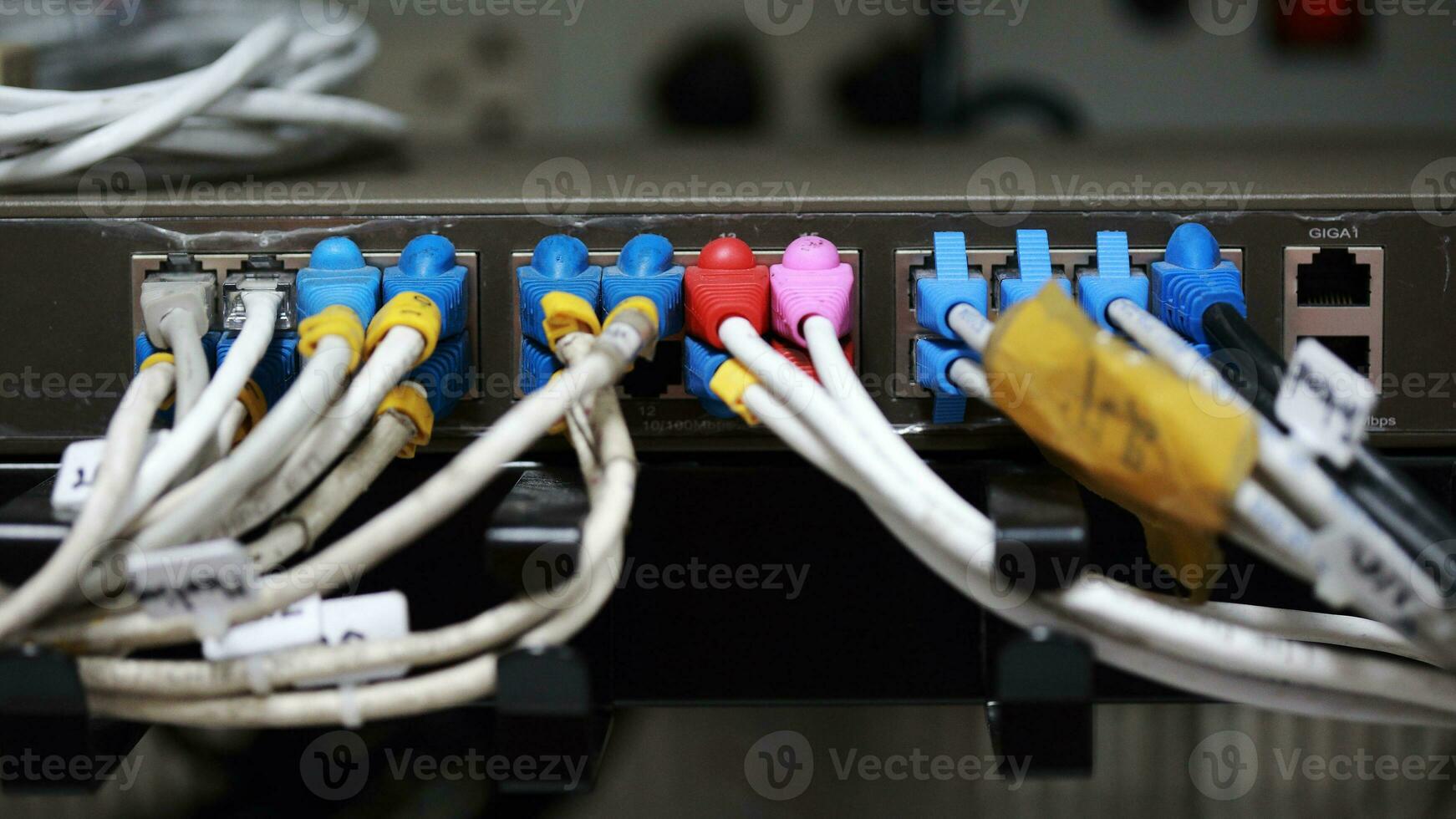 Technology center network server room with UTP Network cables photo