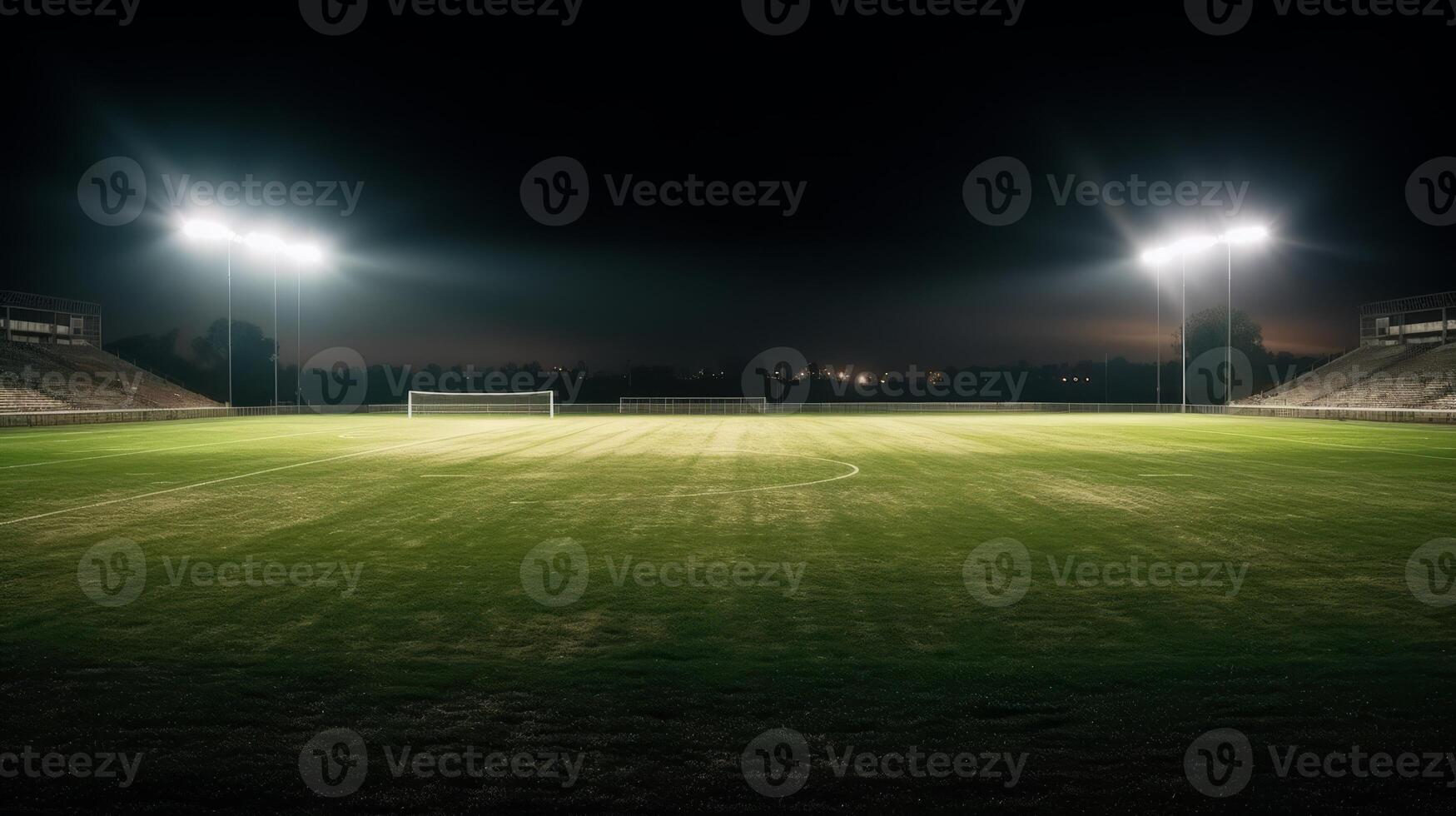 universal grass stadium illuminated by spotlights and empty green grass playground photo