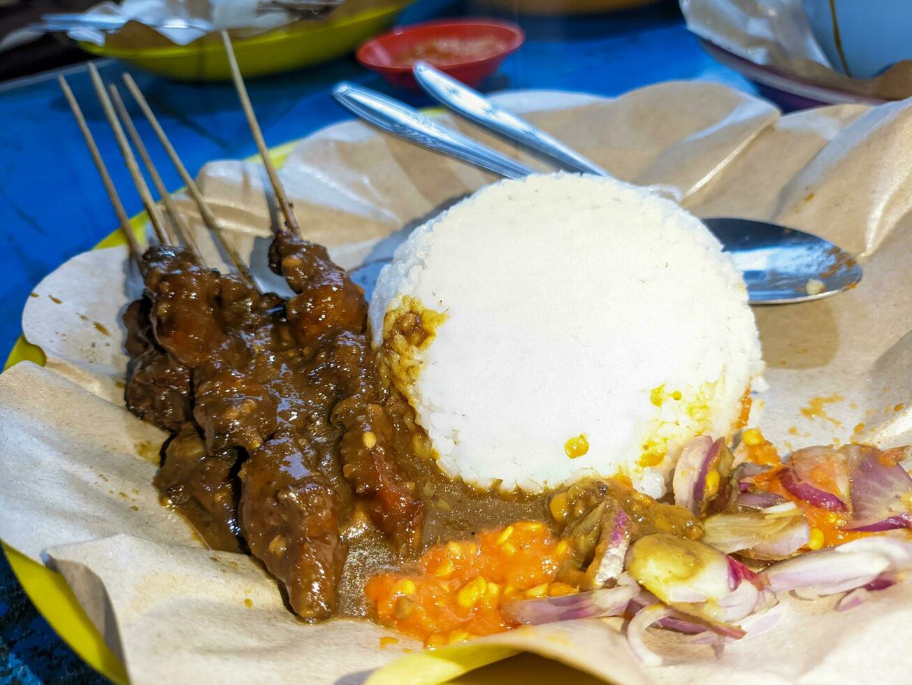 a portion of delicious sate kambing or mutton satay. Indonesian special food photo
