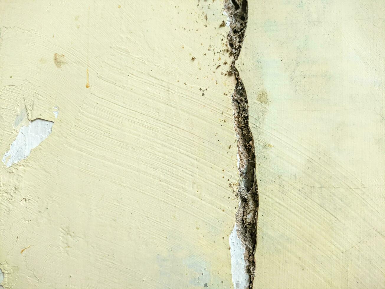 A close up of cracked wall textured background photo