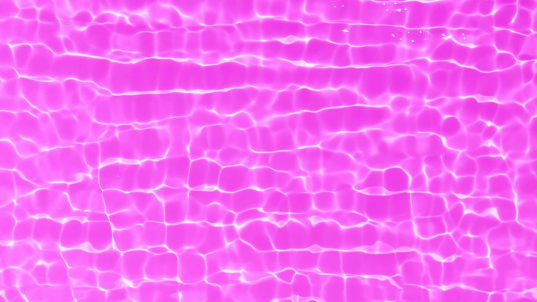 Purple water with ripples on the surface. Defocus blurred transparent pink colored clear calm water surface texture with splashes and bubbles. Water waves with shining pattern texture background. photo