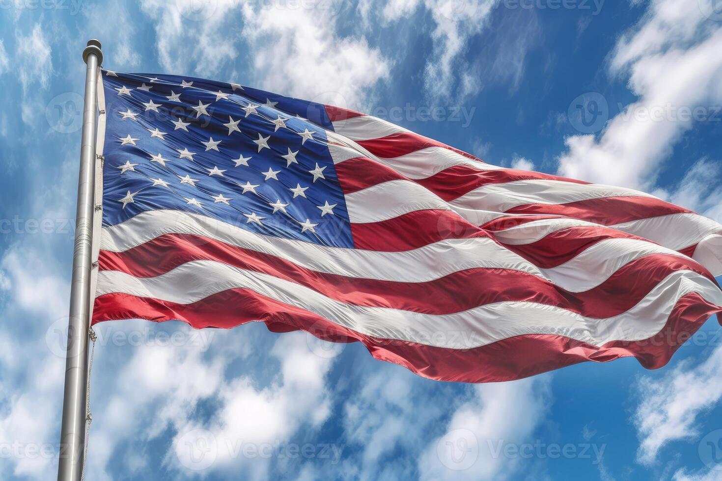Photo of an American flag waving proudly in the sky symbolizing the spirit of freedom and national pride.