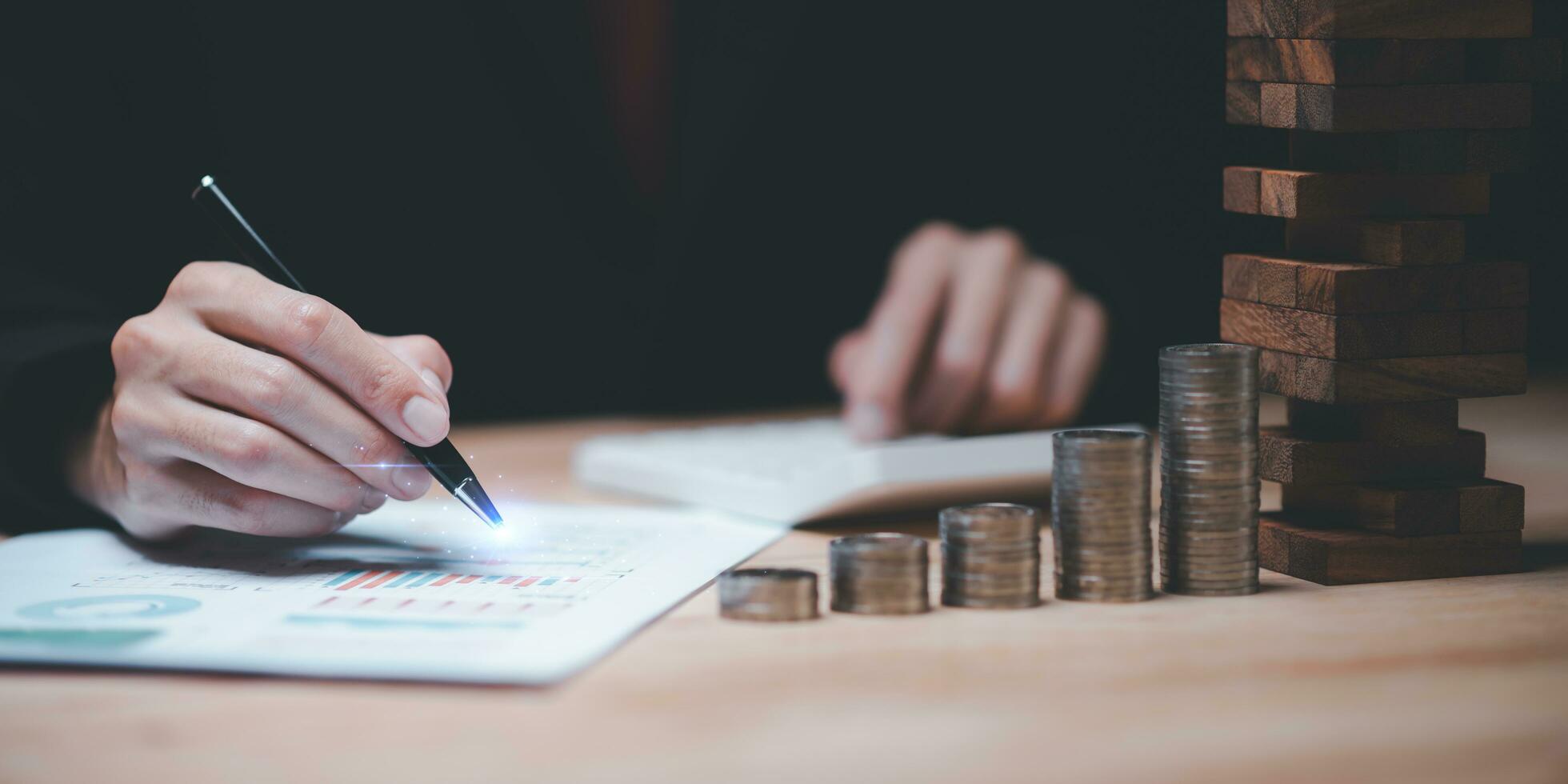 Business people reviewing and analyzing financial and investment statistics graphs and charts ,to manage business risks ,Financial risk management concept ,financial balance ,Fault protection photo