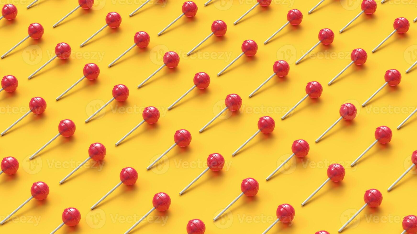 Many sweet lollipops arranged in rows on yellow background photo