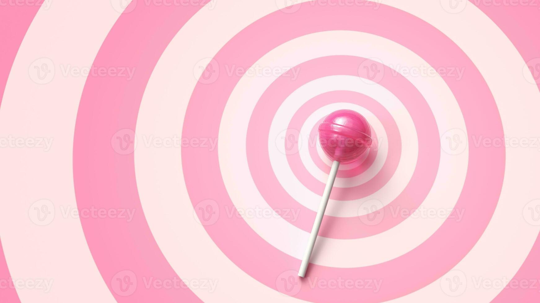 Sweet pink lollipop on stick on pink circles background photo