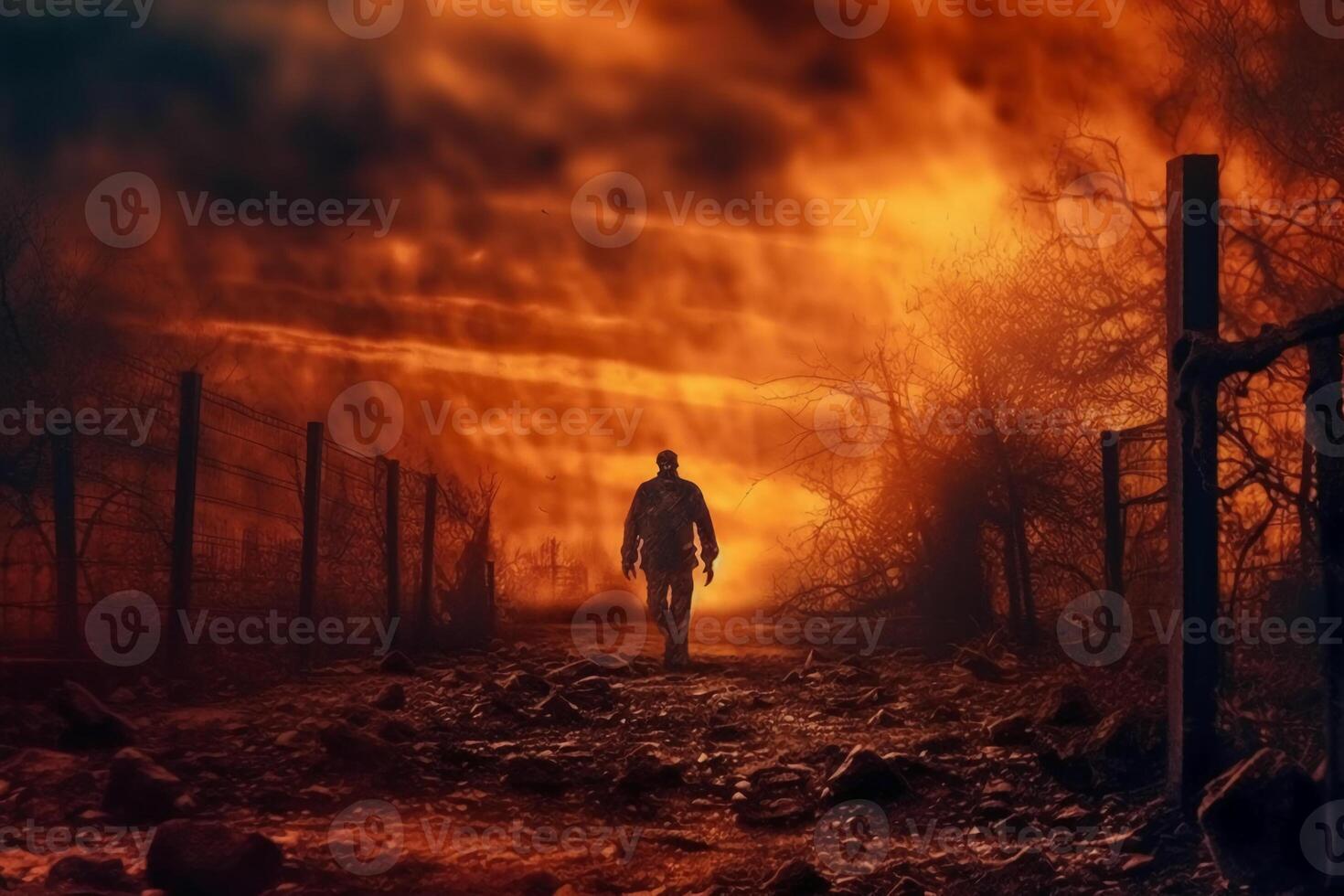 Zombie walking in the burnt cemetery with burning sky. photo