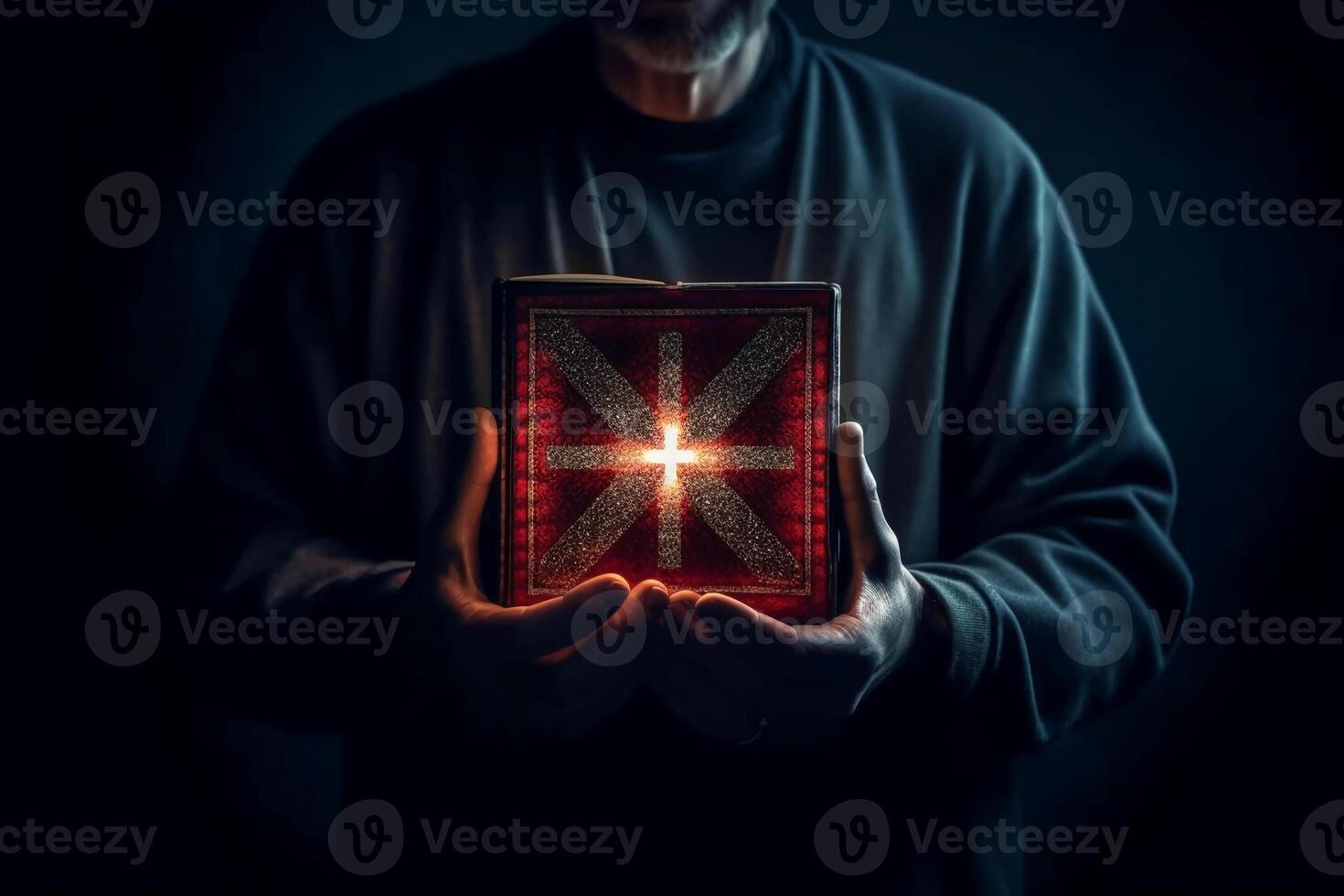 Man is holding and hugging the bible on his chest with atmosphere light. photo