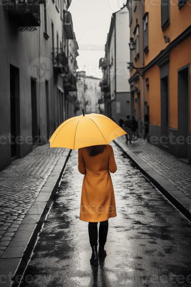 amarillo paraguas en mano de mujer caminando en un incoloro calle. ai generativo foto