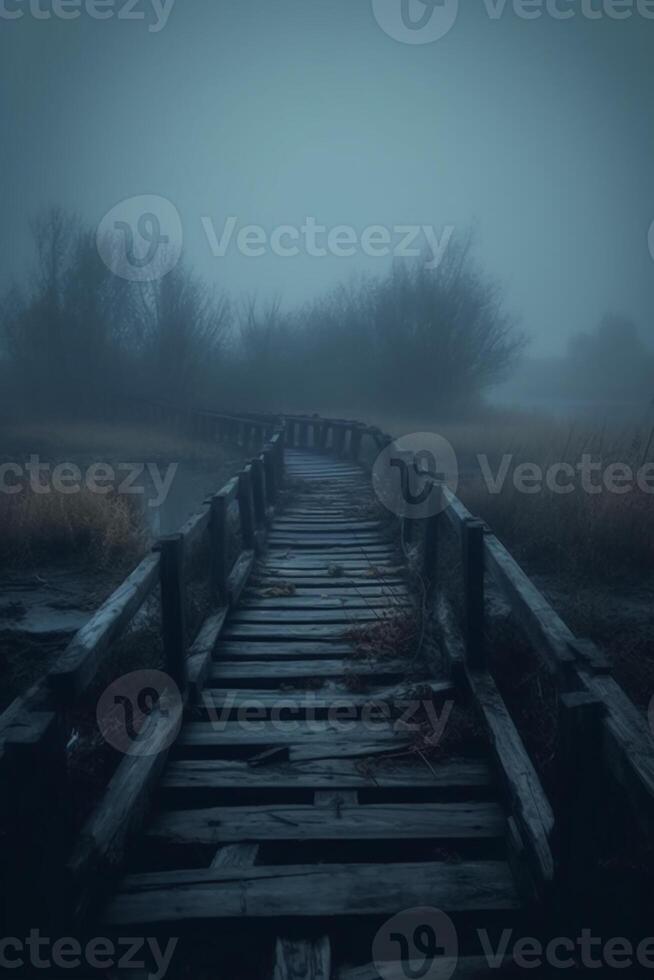Old wooden bridge leading to nowhere in the fog, broken, gloomy dark blue, mysterious, loneliness. photo