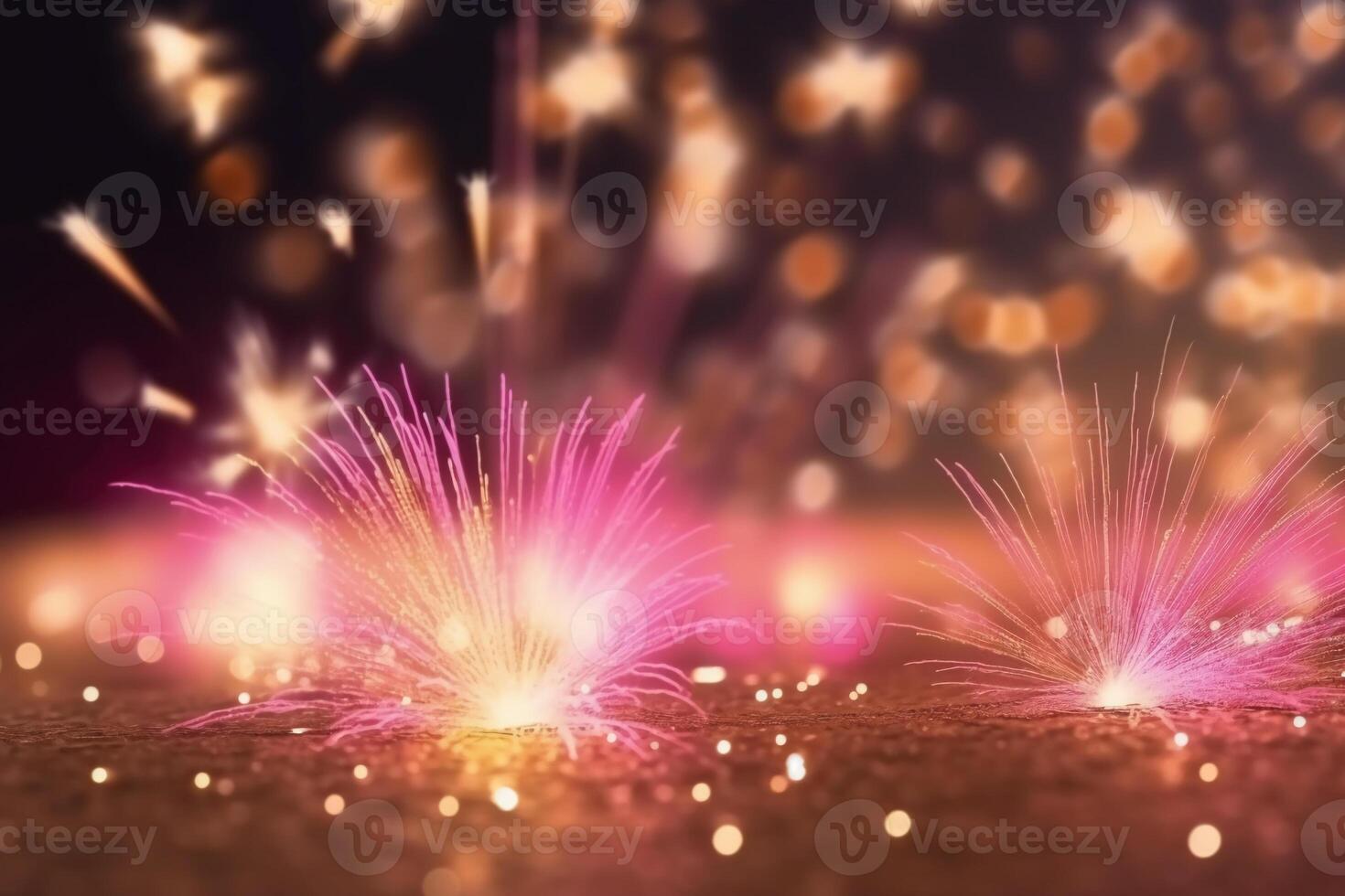 Gold and pink Fireworks and bokeh in New Year eve and copy space. Abstract background holiday. photo