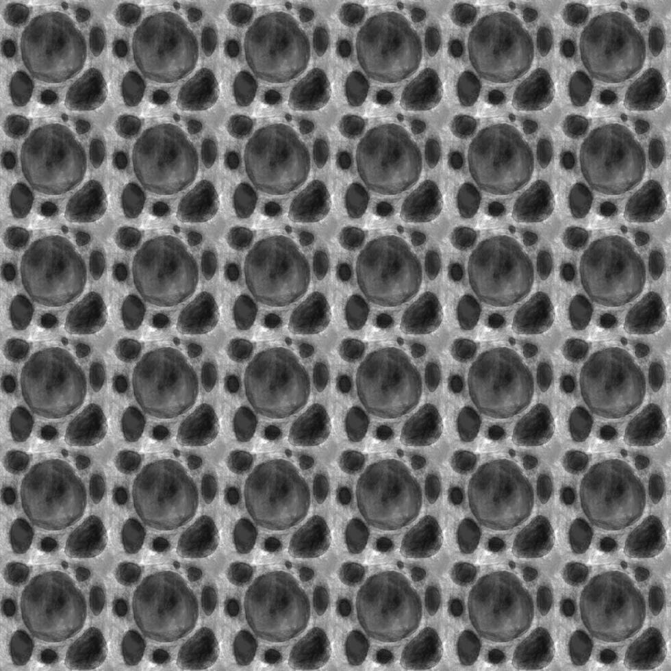 A black and white pattern of circles with a black background photo