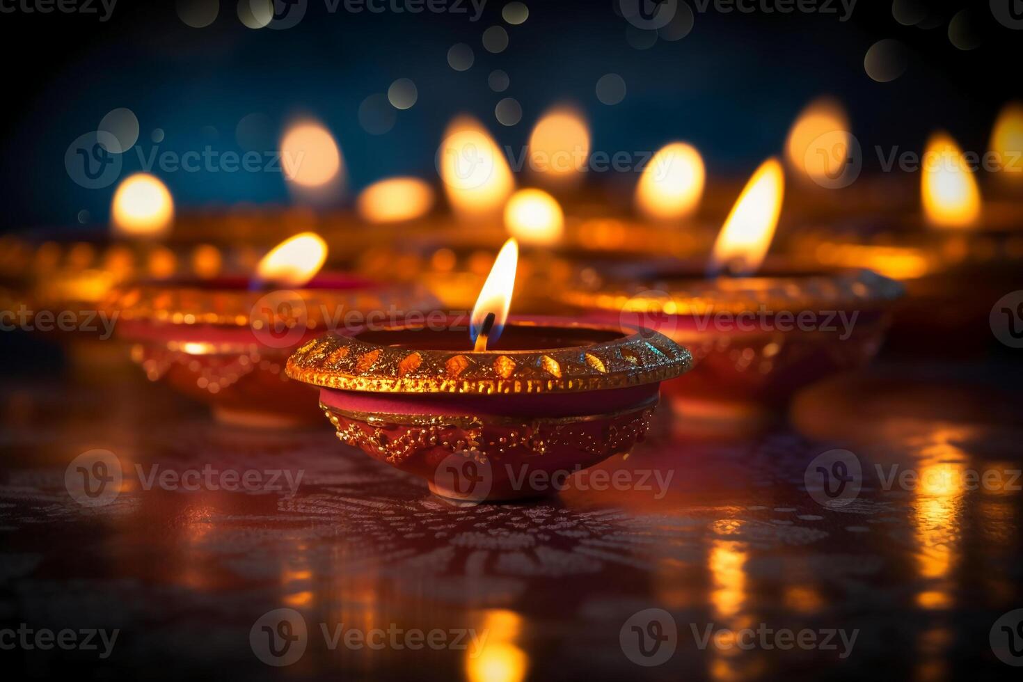 A Diya oil lamp, Diwali concept, blurred Hindu festival of lights celebration background. photo