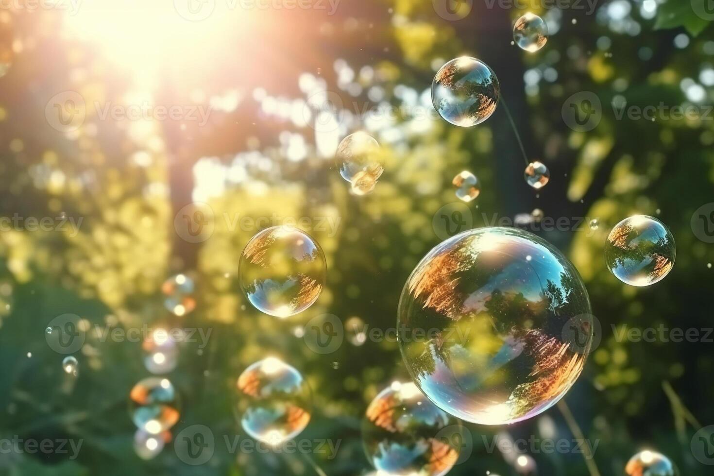 Soap bubbles against a blurred light natural summer background. photo