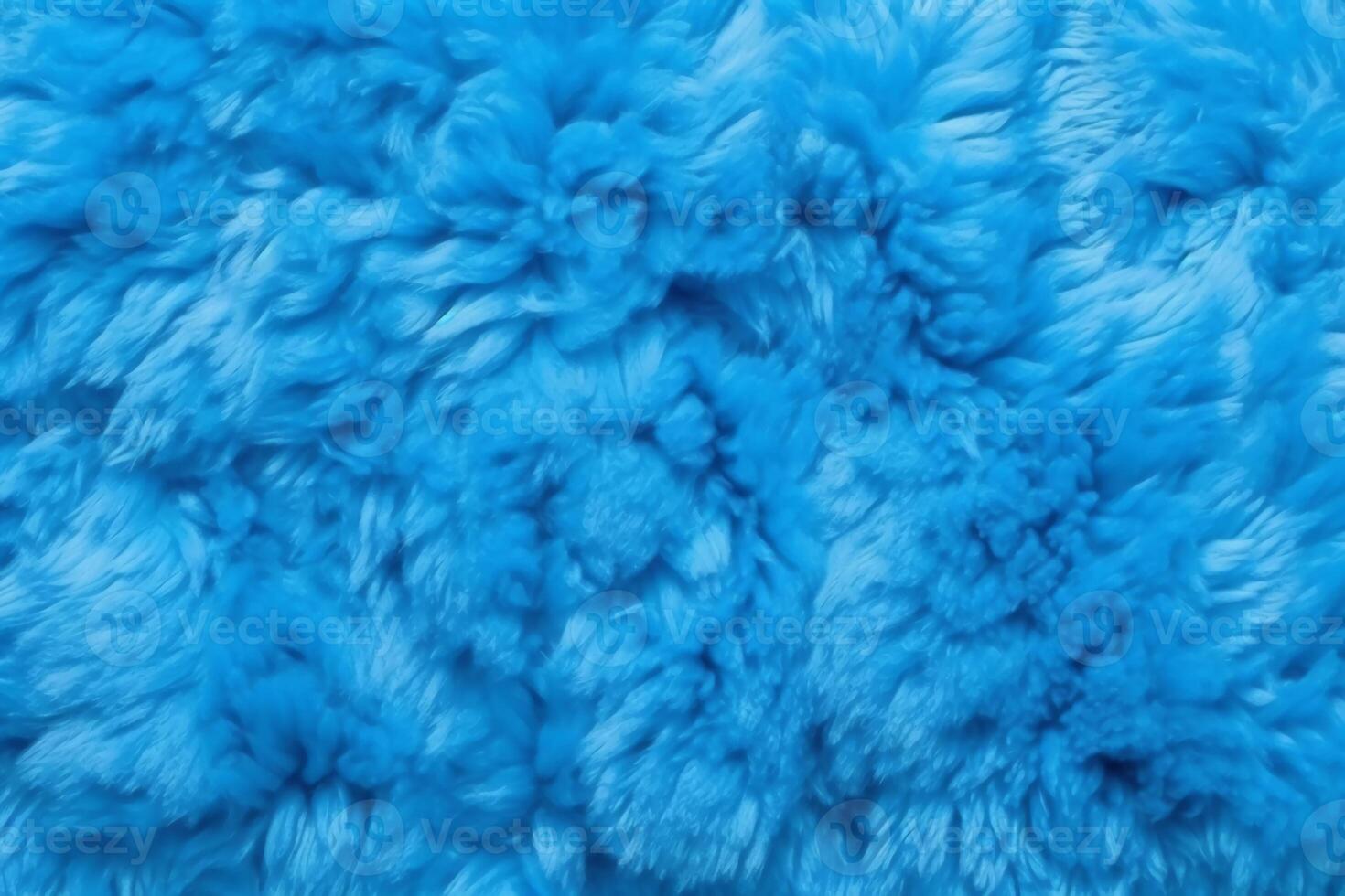 Very peri blue color sheep fur sheepskin rug background Wool texture. photo