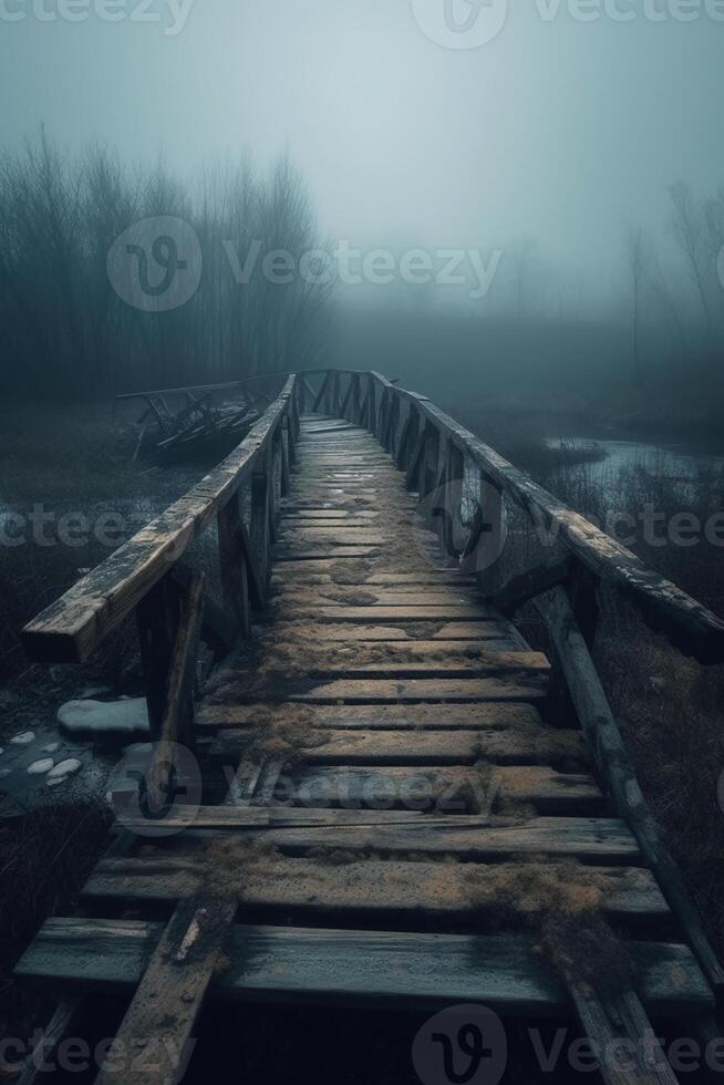 Old wooden bridge leading to nowhere in the fog, broken, gloomy dark blue, mysterious, loneliness. photo