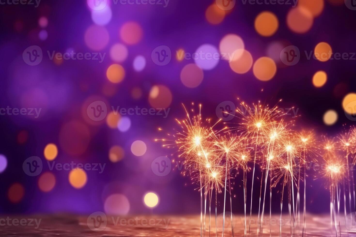 Gold and purple Fireworks and bokeh in New Year eve and copy space. Abstract background holiday, photo