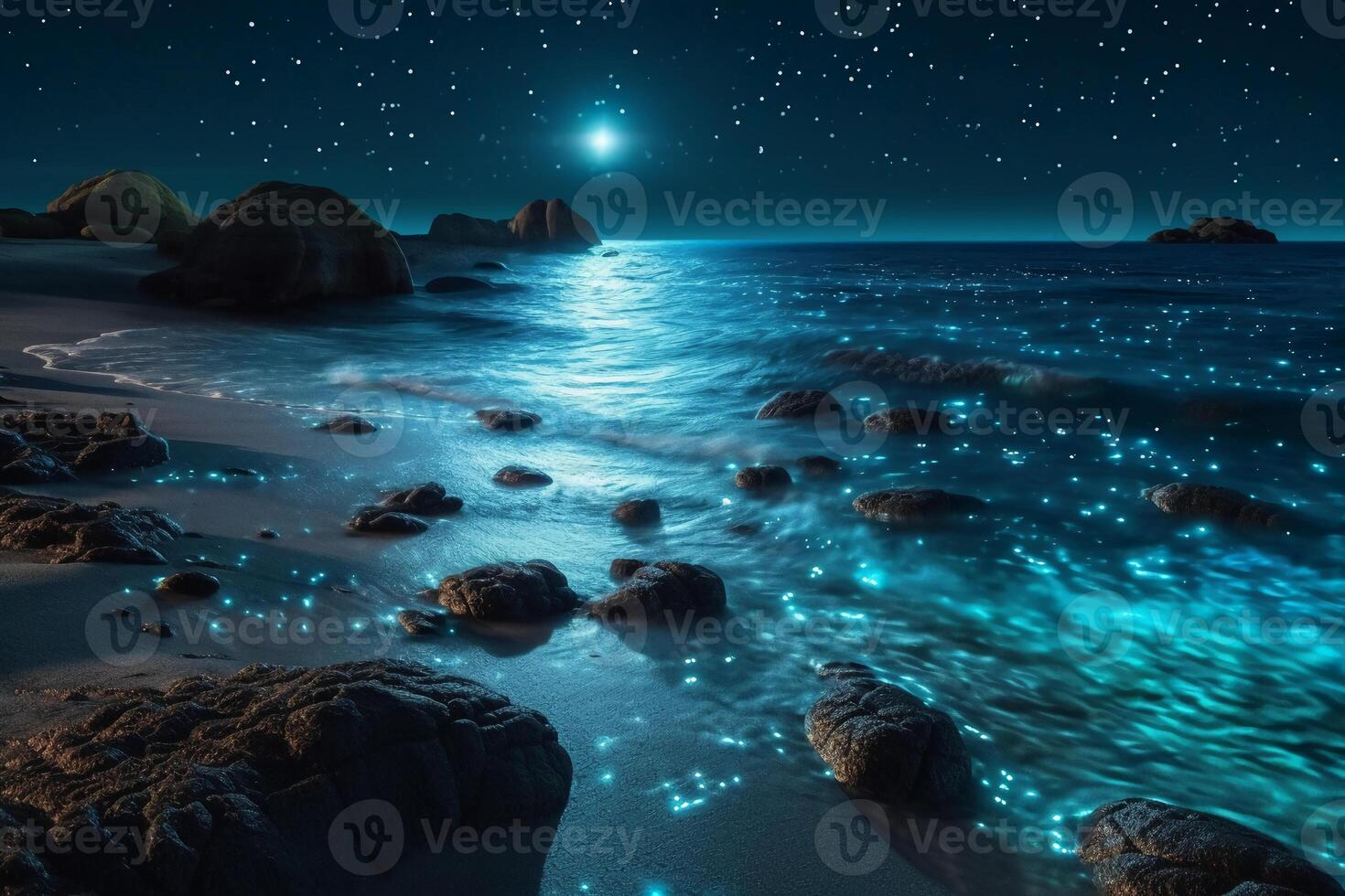 Ocean shore at night, the water is full of dinoflagellates, glowing with millions bright blue neon glow in the dark tiny dots. photo