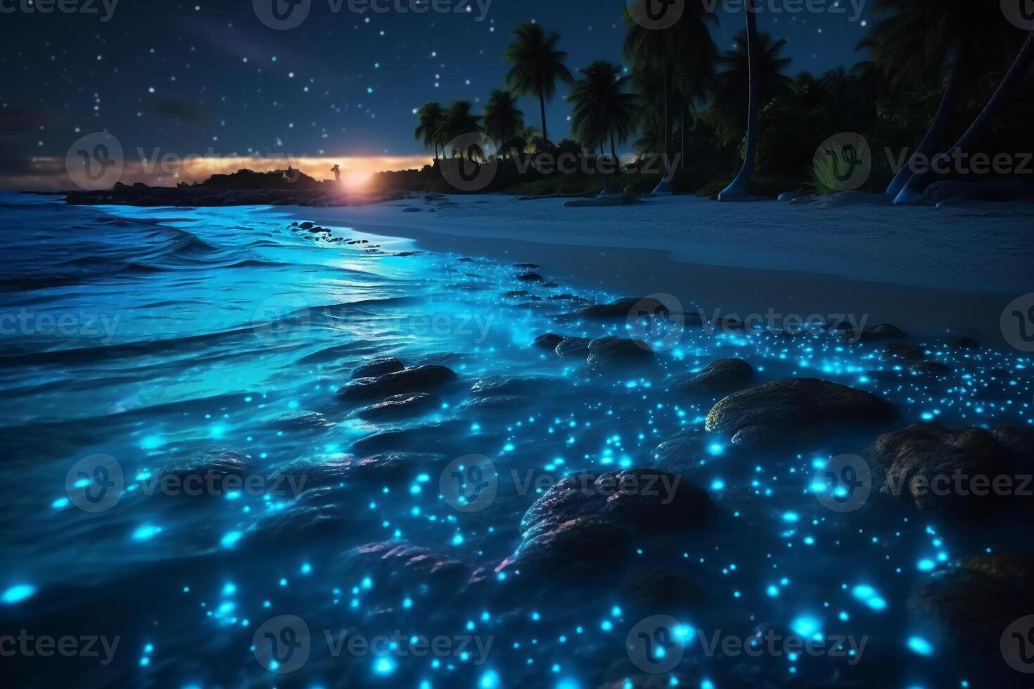 Ocean shore at night, the water is full of dinoflagellates, glowing with millions bright blue neon glow in the dark tiny dots. photo