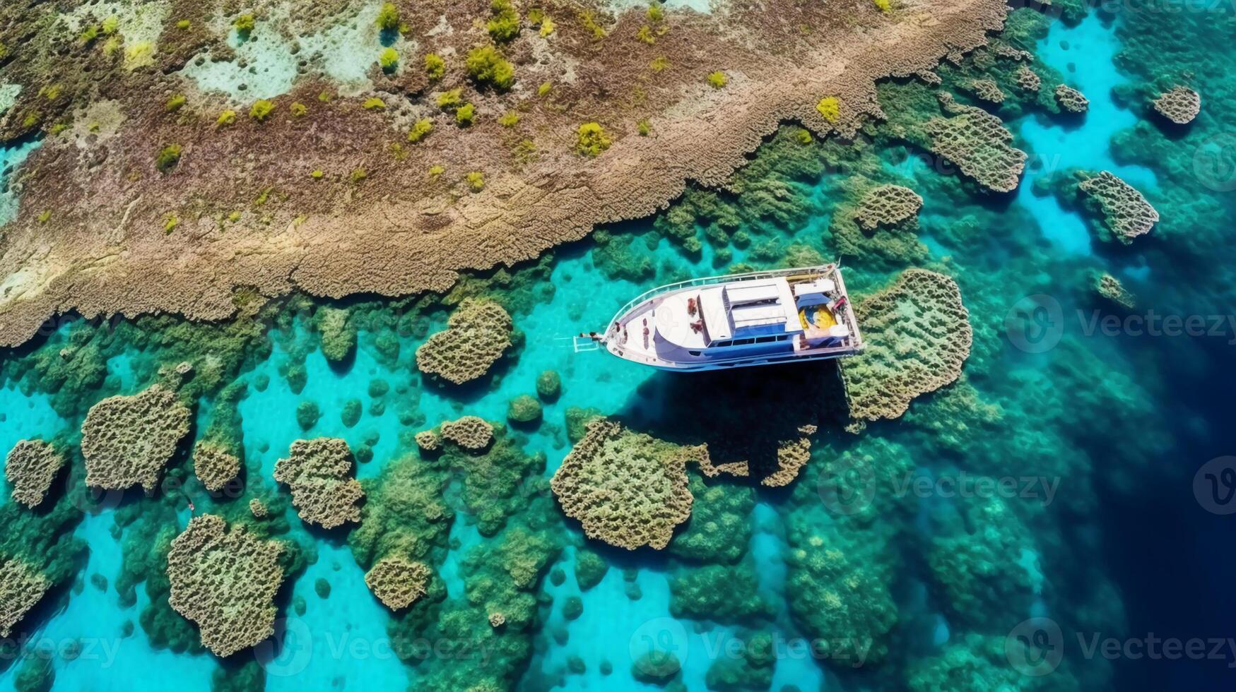 An aerial shot of a tropical island's lagoon, with shallow turquoise waters and coral formations creating intricate patterns beneath the surface. photo