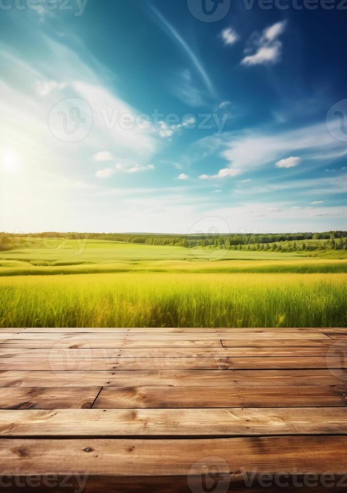 Spring summer beautiful background with green juicy young grass and empty wooden table in nature outdoor. Natural template landscape with blue sky and sun. photo