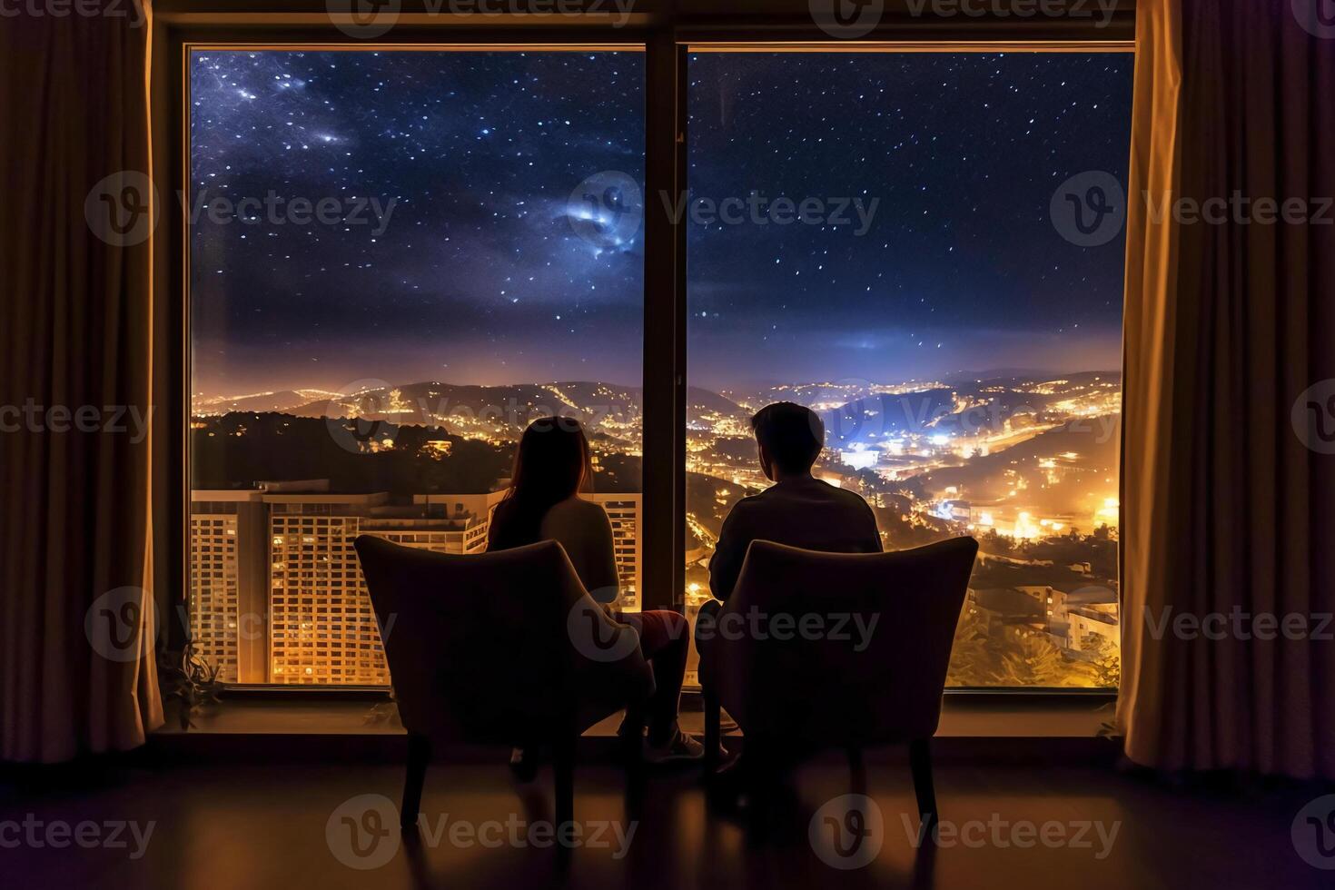 The back of a couple sitting by the hotel window, The view through the window is a starry night. photo