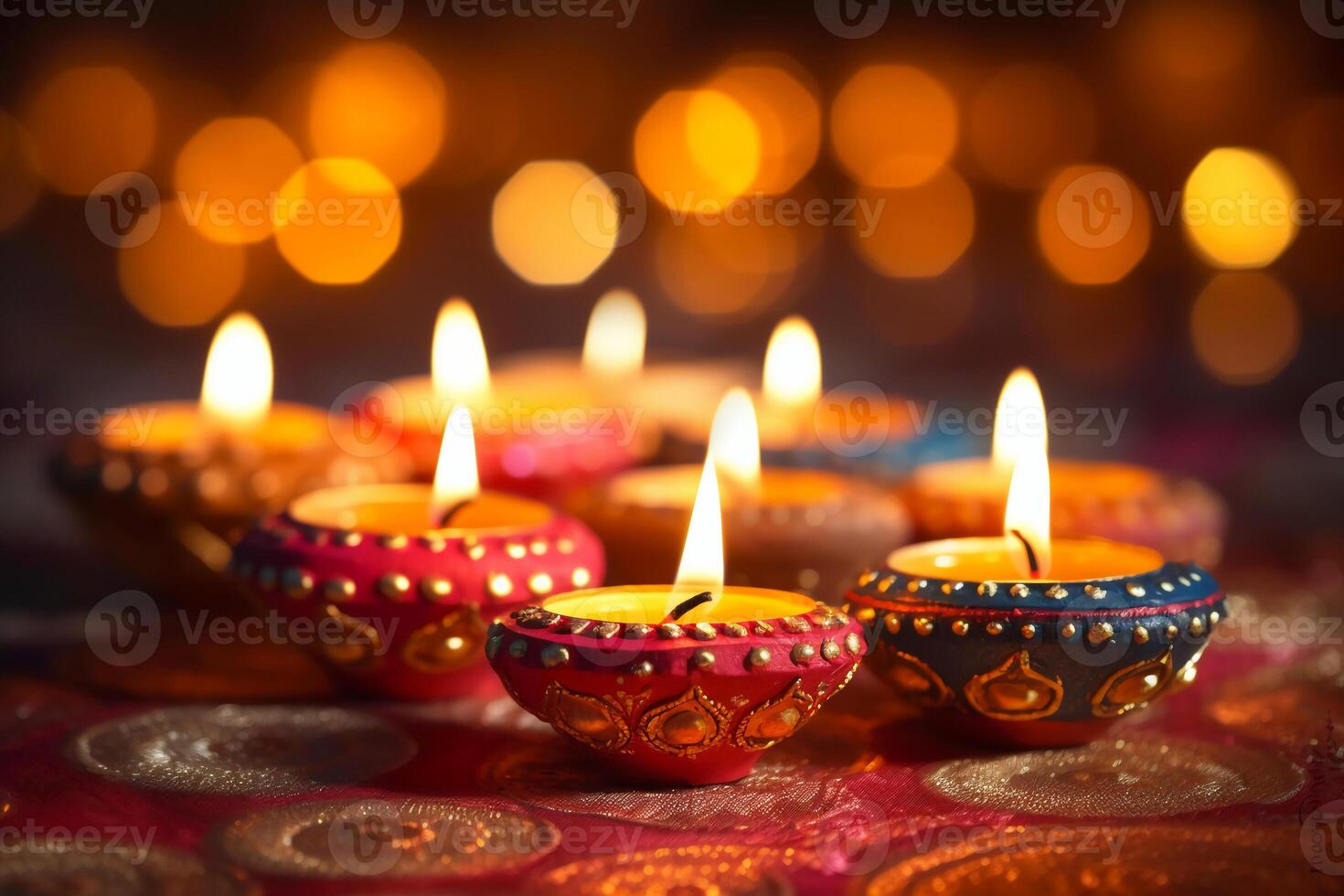 A Diya oil lamp, Diwali concept, blurred Hindu festival of lights celebration background. photo