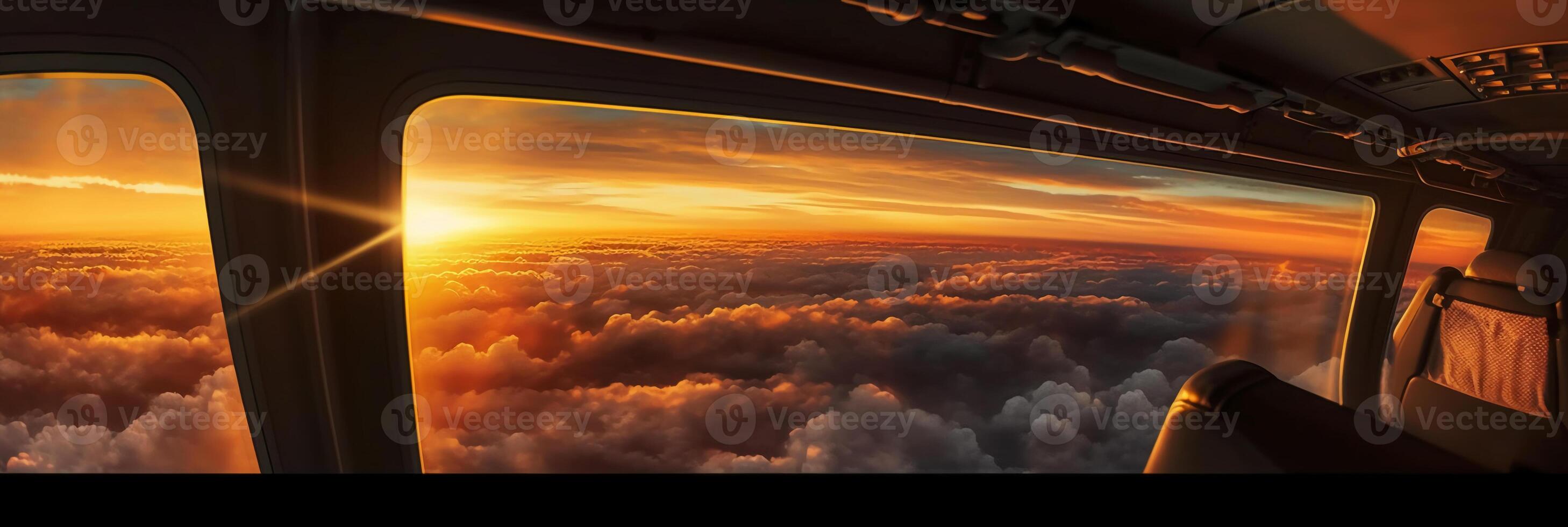 The view from the plane window to the sunset. Aerial view. photo