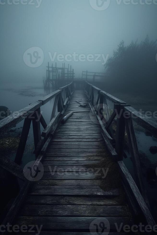 Old wooden bridge leading to nowhere in the fog, broken, gloomy dark blue, mysterious, loneliness. photo