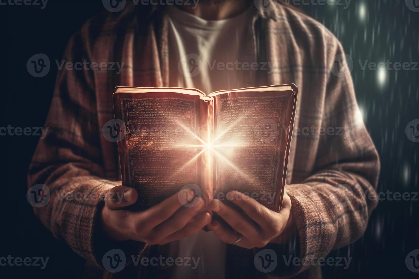 Man is holding and hugging the bible on his chest with atmosphere light. photo