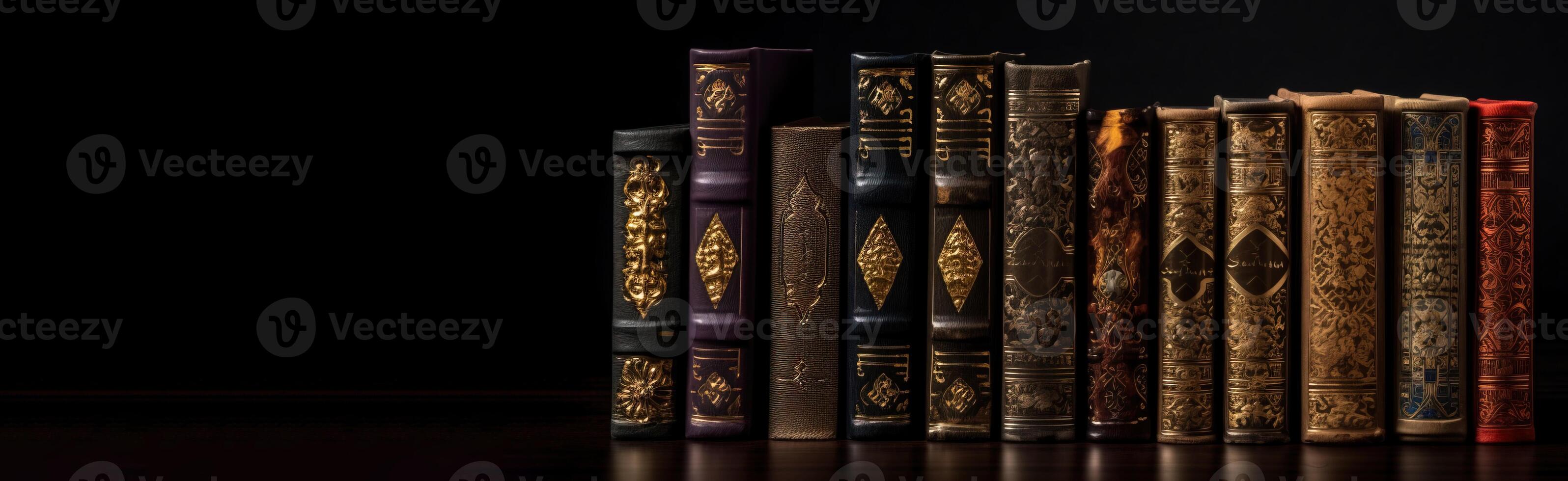 Number of old ancient books, library of knowledge textbooks. Black background isolate. . photo
