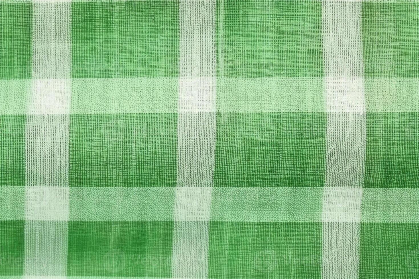 green fabric textile pattern, plaid background, linen cotton. photo