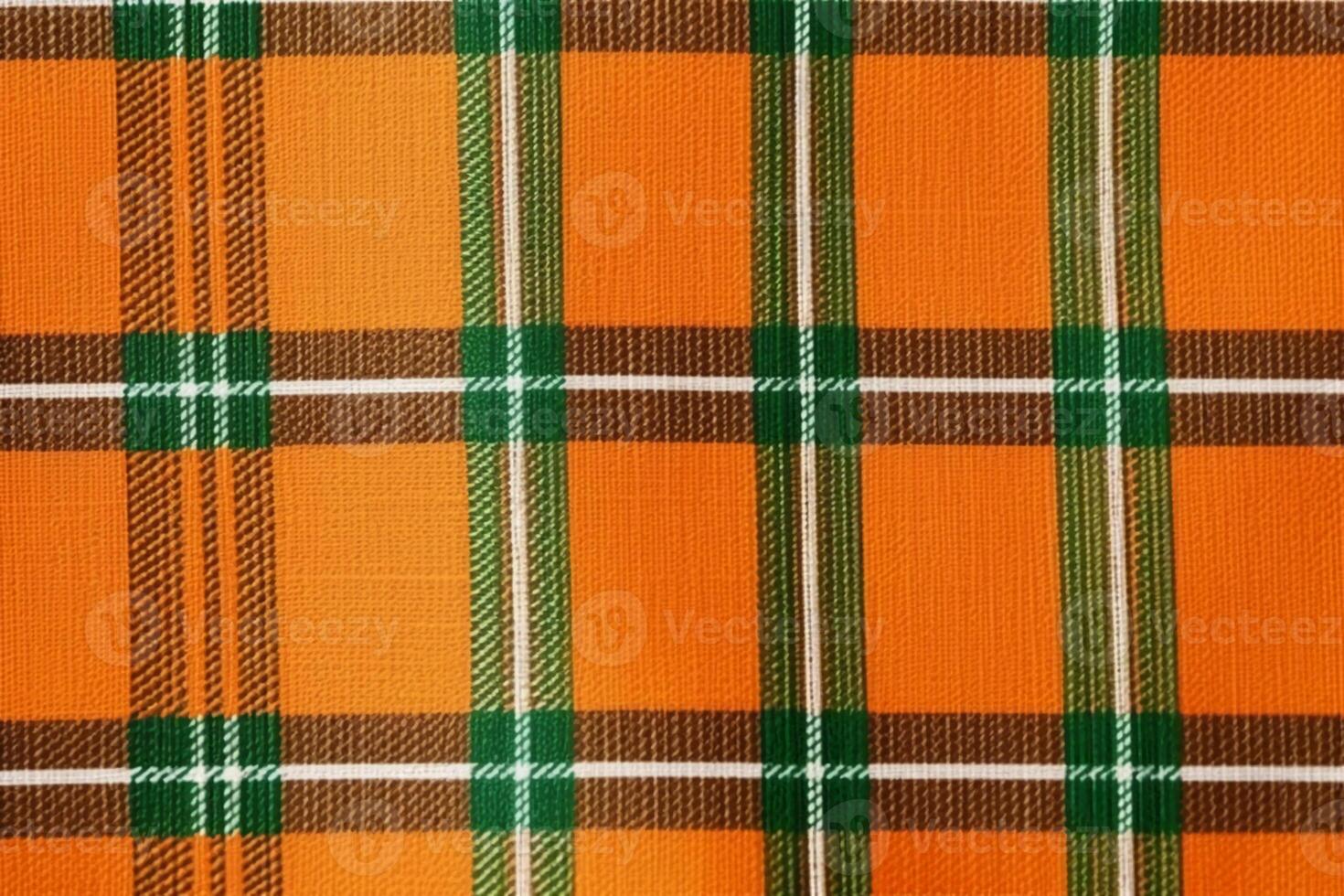 orange fabric textile pattern, plaid background, linen cotton. photo