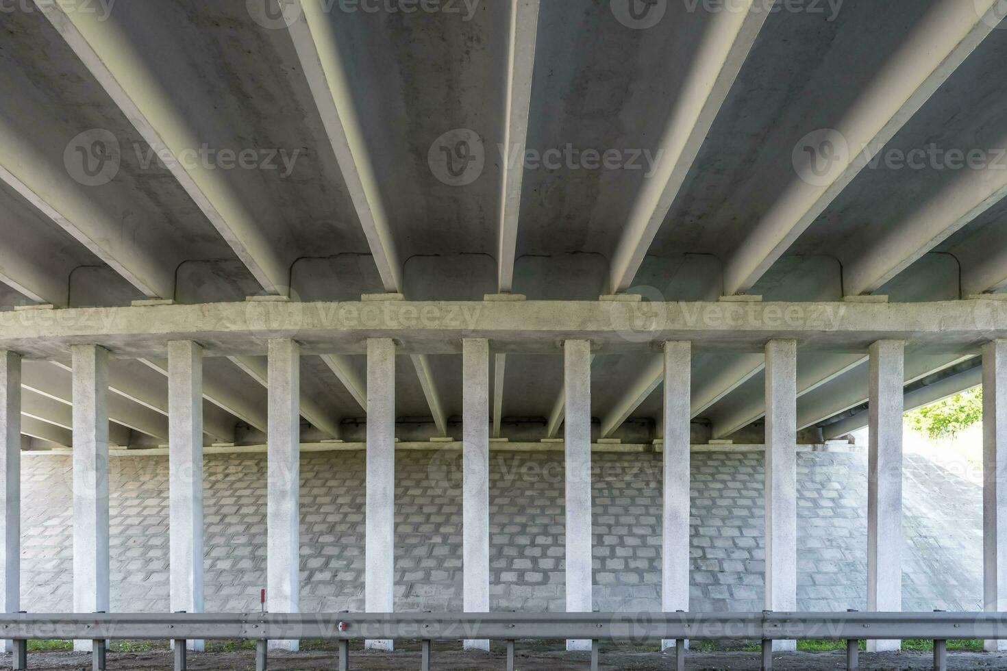 concrete columns like pillars of an automobile bridge photo