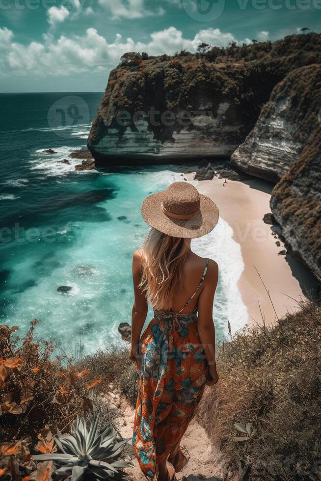 Standing woman wearing summer yellow look, Best Beaches. photo