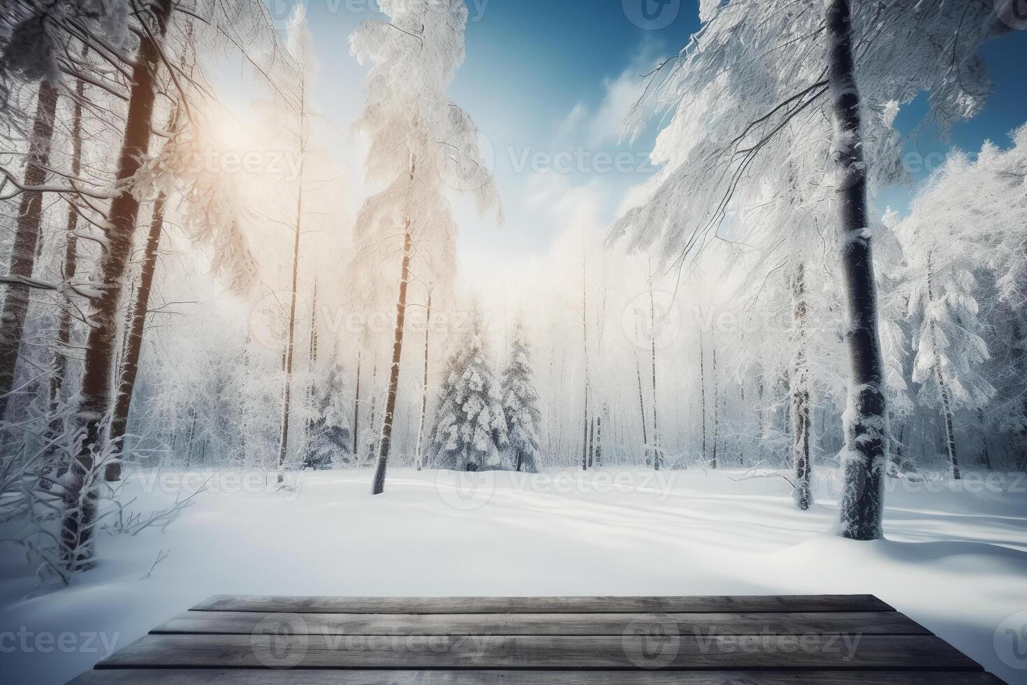 Winter Christmas scenic landscape with copy space. Wooden flooring, white trees in forest covered with snow, snowdrifts and snowfall against blue sky in sunny day photo