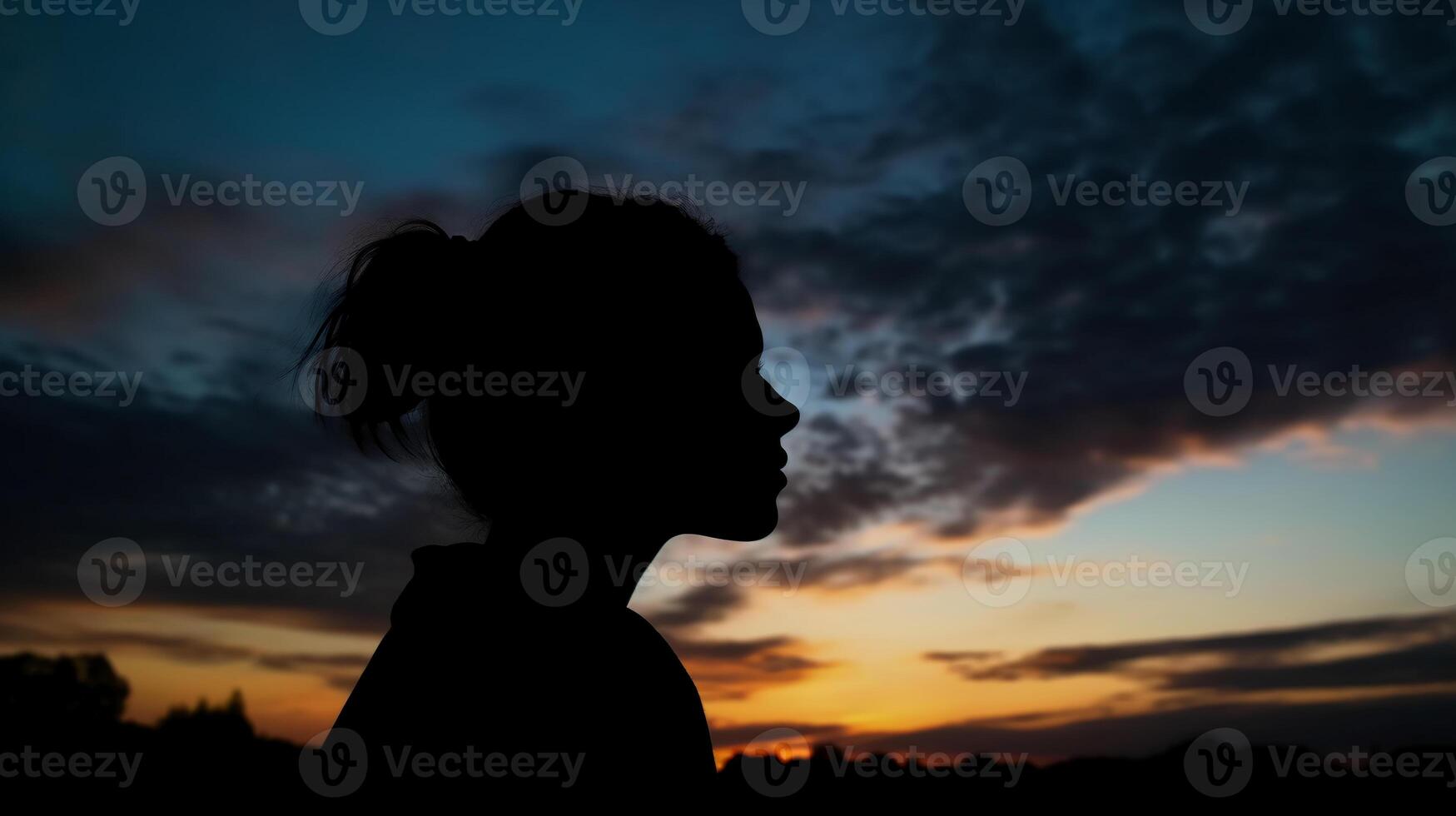 Side view, Silhouette of the face, a person, low angle, blurred fresh dawn sky. photo