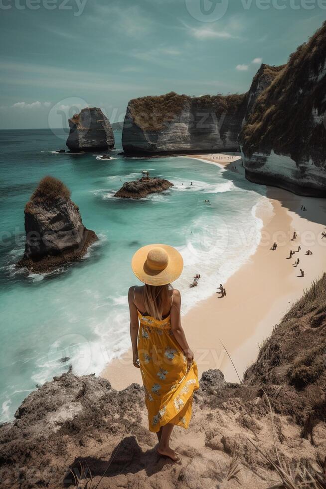 Standing woman wearing summer yellow look, Best Beaches. photo