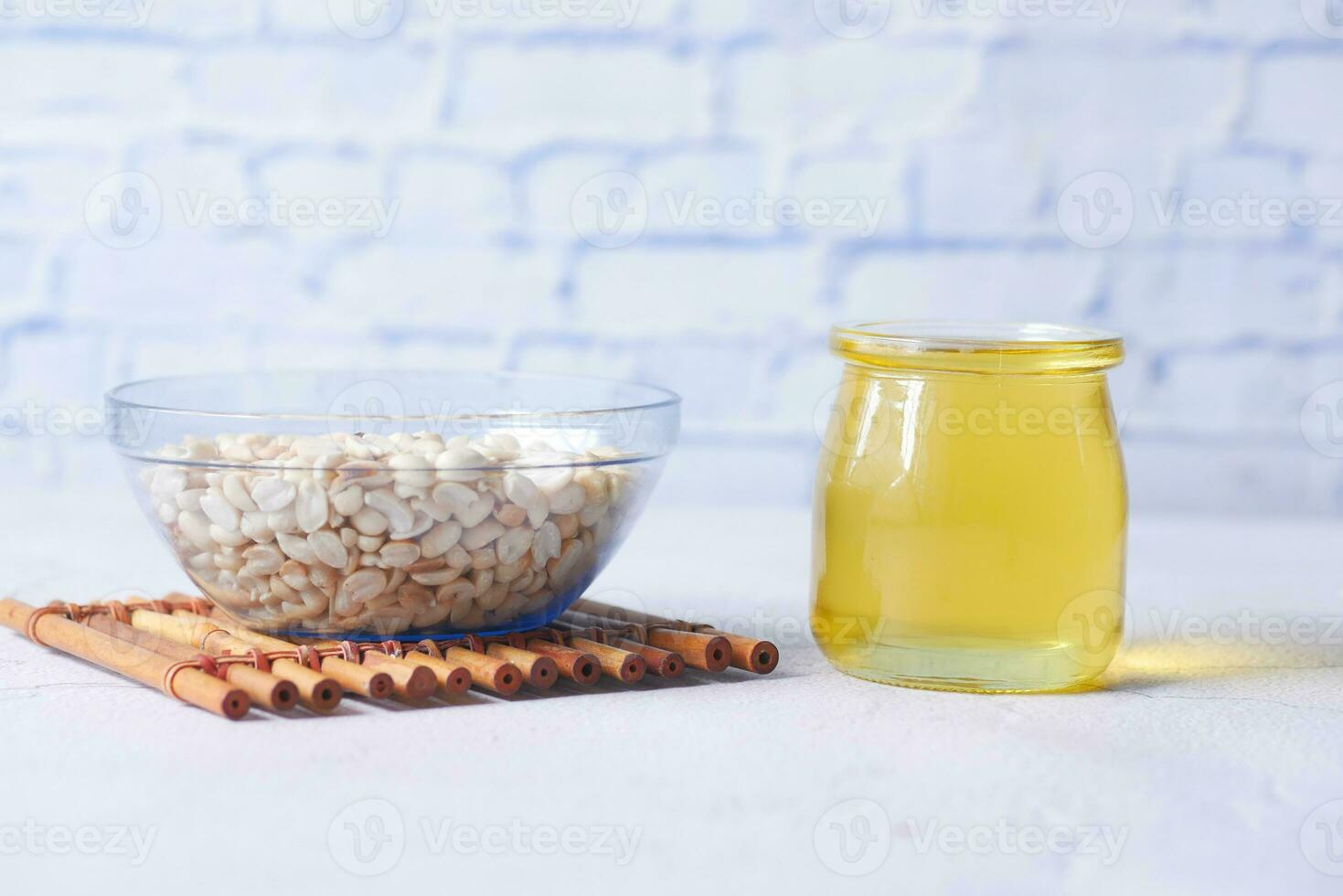peanuts and oils in a container photo