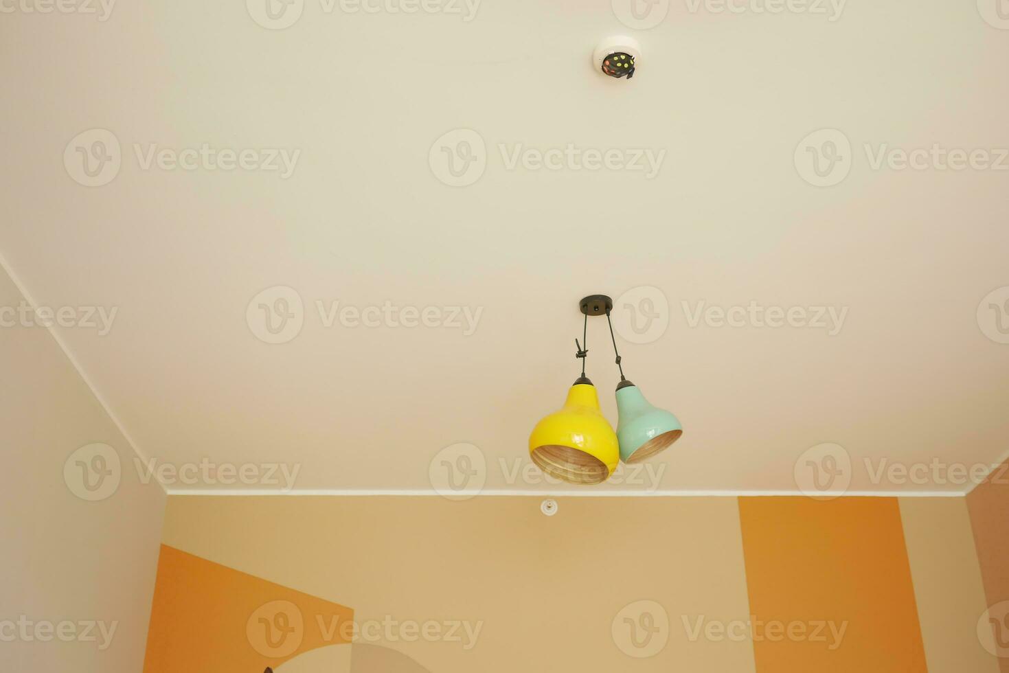 gray ceiling lamp hanging in a room , photo