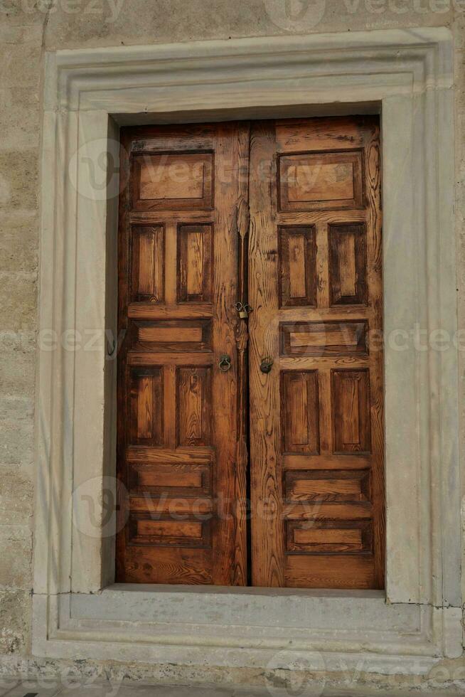 a brown wood old door in singapore photo