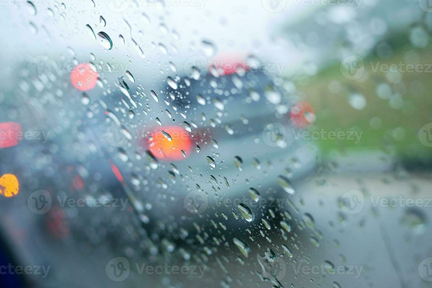 Rain drops on car window , rainy day 24200461 Stock Photo at Vecteezy