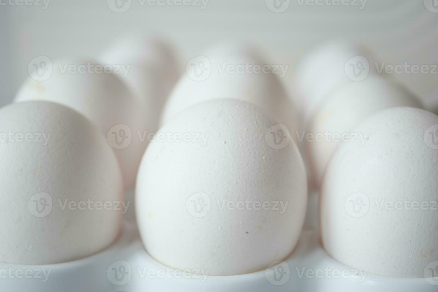 close up of eggs in a bowl. photo
