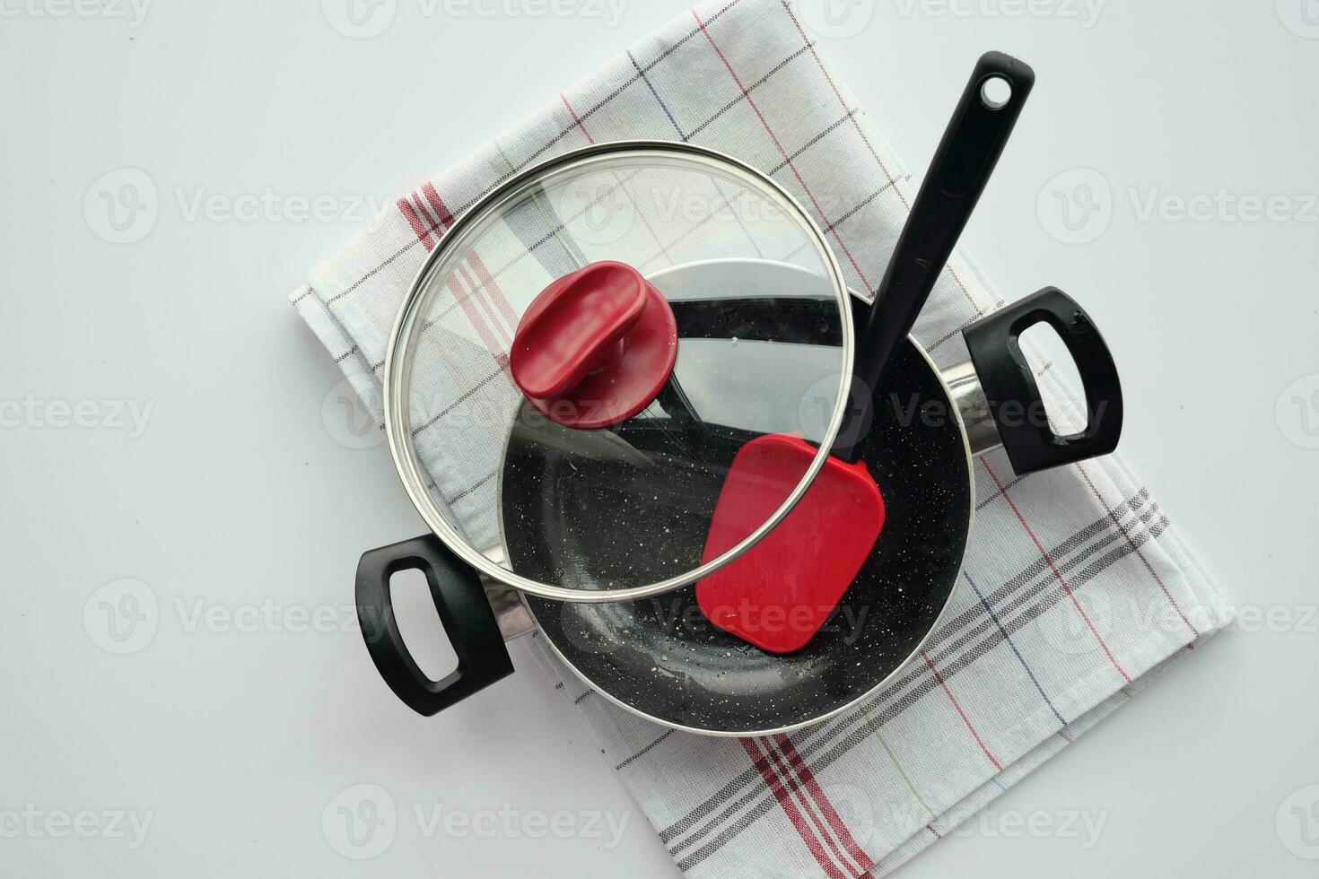 empty frying pan on white background photo