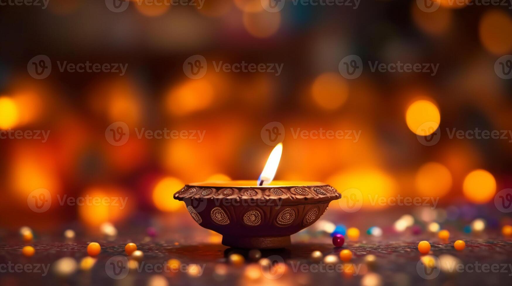 A Diya oil lamp, Diwali concept, blurred Hindu festival of lights celebration background. photo